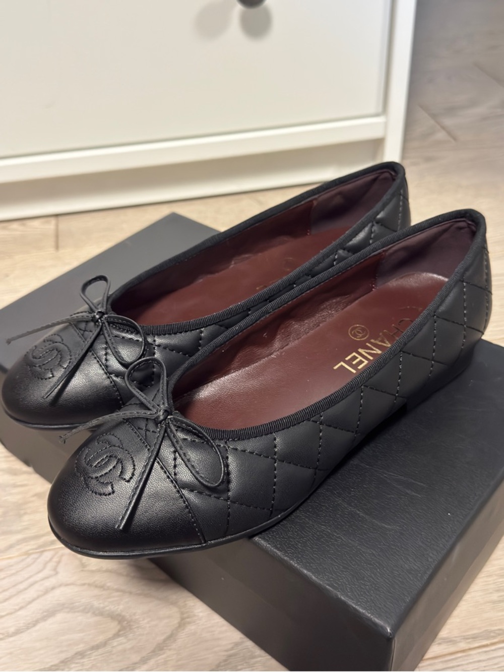 CHANEL Black Quilted Leather Bow Ballet Flats